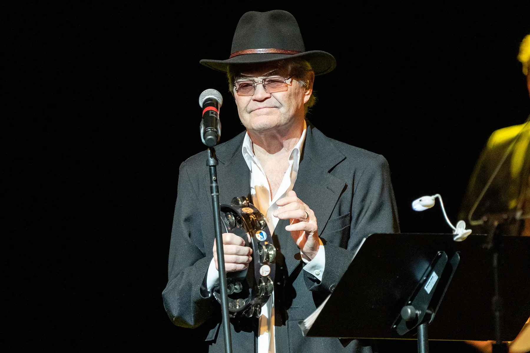 Micky Dolenz performing on tour